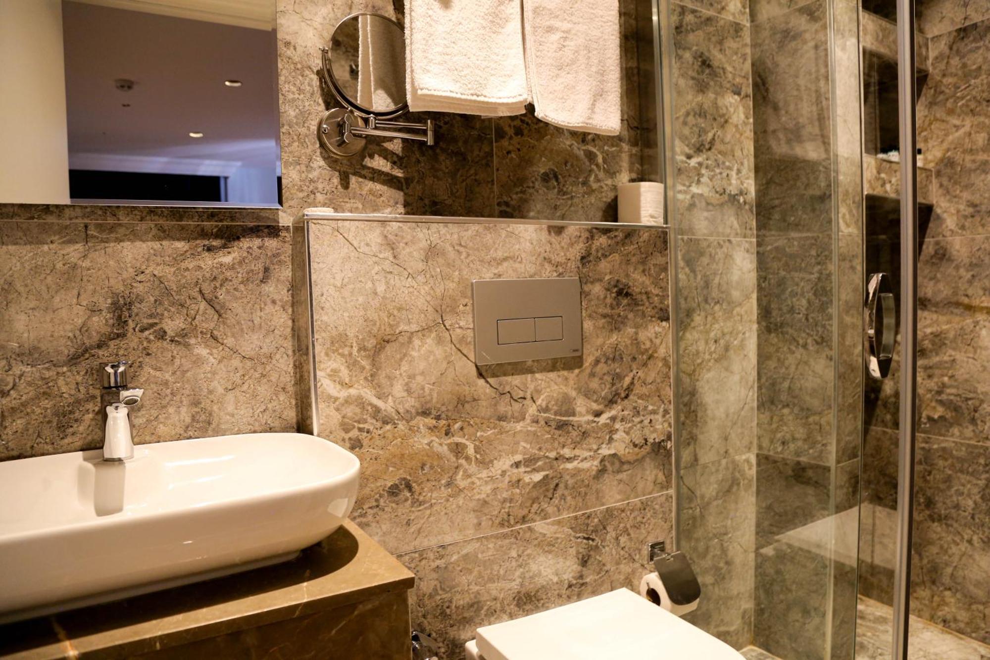 Axu Airport Hotel Arnavutkoy Exterior photo A bathroom with a shower cubicle